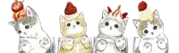 four cats with strawberries on top of their heads