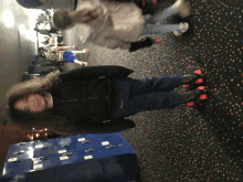 a girl wearing roller skates stands in front of blue lockers