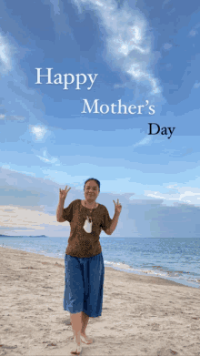 a woman stands on a beach with the words happy mother 's day written above her