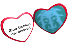 a heart shaped mirror with the words blue goblins my beloved written on it