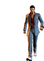 a man in a suit is walking with his fist up