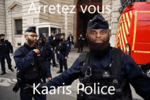 a group of police officers standing in front of a building with the words arretez vous kaaris police