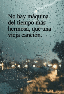 a picture of a window with a quote in spanish on it