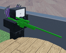 a person holding a green sniper rifle with a smiley face on the screen