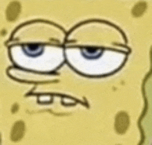 a close up of a cartoon character 's face with a spongebob squarepants face .