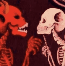 a devil and a skeleton are standing next to each other in a dark room .