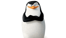 a penguin from madagascar is standing with his arms folded