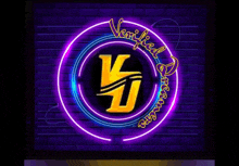 a neon sign with the letter v and j in a circle