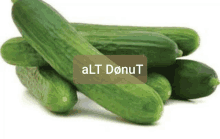 a bunch of cucumbers are stacked on top of each other with alt donut written above them