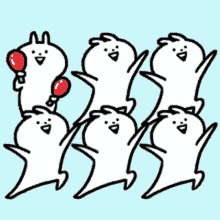 a group of cartoon rabbits are dancing together and one is holding a red balloon