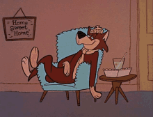 a cartoon character is laying in a chair with a sign that says home sweet home