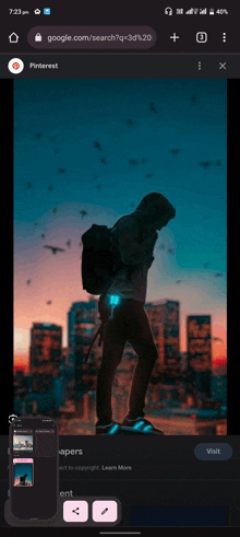 a phone screen shows a picture of a man standing in front of a city skyline