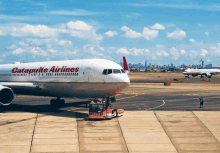 a catapulte airlines plane sits on the tarmac