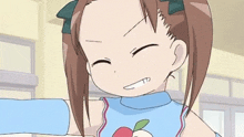 a cartoon girl with brown hair and a blue shirt with an apple on it .