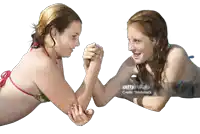 two girls in bikinis arm wrestling with the caption " thinkstock "