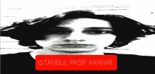 a black and white photo of a man with a red istanbul pasif aranir sticker