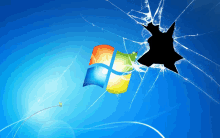 a broken screen with a windows logo in the background