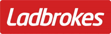 a red sign with the word ladbrokes in white letters