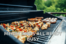 a barbecue with the words merry xmas all ready busy