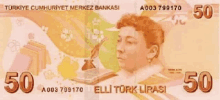 a 50 elli turk lirasi banknote with a woman 's face on it