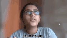 a girl wearing glasses and a blue shirt says oh god pls help