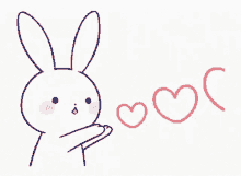 a drawing of a bunny blowing three hearts