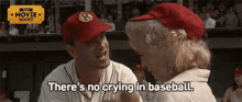 a man and a woman are sitting next to each other in a baseball dugout .