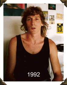 a picture of a man in a tank top with the year 1992 on the bottom