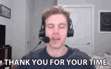 a man wearing a headset is saying thank you for your time