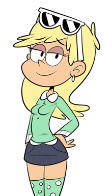 a cartoon character from the loud house wearing a green shirt and polka dot socks .