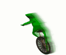 a green frog is riding a bike on a wheel .