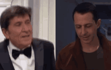 a man in a tuxedo and bow tie is talking to another man