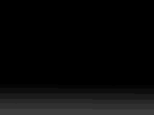 a black background with a white gradient in the middle