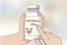 a person is holding a bottle of anti delu pills with a clown face on it .