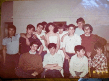 a group of young people posing for a picture on a date of august 14th