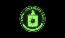 the logo for the central intelligence agency is glowing in the dark