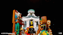 a lego masters au advertisement shows a building being destroyed