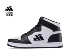 a pair of black and white shoes with a jobs logo on the side