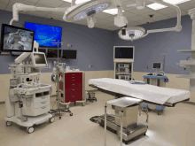 an empty operating room with a monitor that says evidia