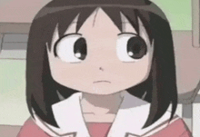 a close up of a cartoon character 's face with a serious look on her face .