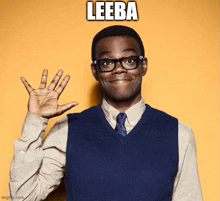 a man wearing glasses and a blue vest is waving his hand with the word leeba above him