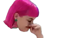 a woman with bright pink hair is covering her nose with her hand