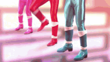 a group of people wearing shiny pants and boots are standing in a line