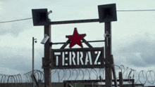 a sign that says terraz on it with a red star