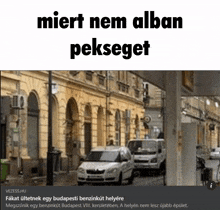 a picture of a city street with the words " miert nem alban peksegit " on top