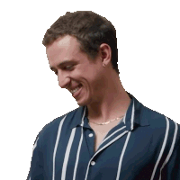 a man wearing a blue and white striped shirt is laughing