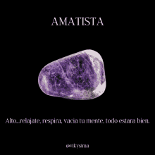 a purple stone with the word amatista written on it