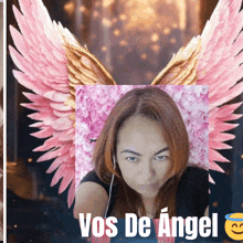 a picture of a woman with angel wings and the words vos de angel on the bottom