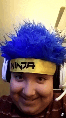 a person wearing headphones and a ninja headband