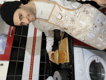 a man wearing an apron that says coffee and tea